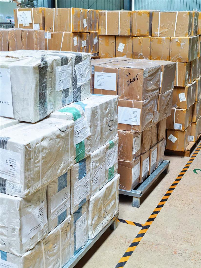 Packed cartons stored in a warehouse